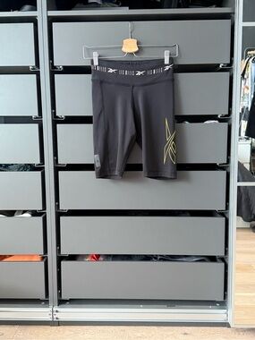 Reebok Les Mills Black Bike Shorts with Yellow Logo